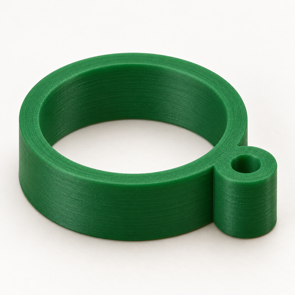 Bague guide-fil à œillet latéral sur mesure – vert. Visualisation IA des dimensions par défaut.