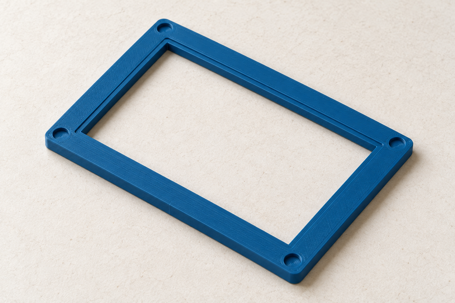 Loose blue filter frame with four empty magnet pockets — AI visualisation.