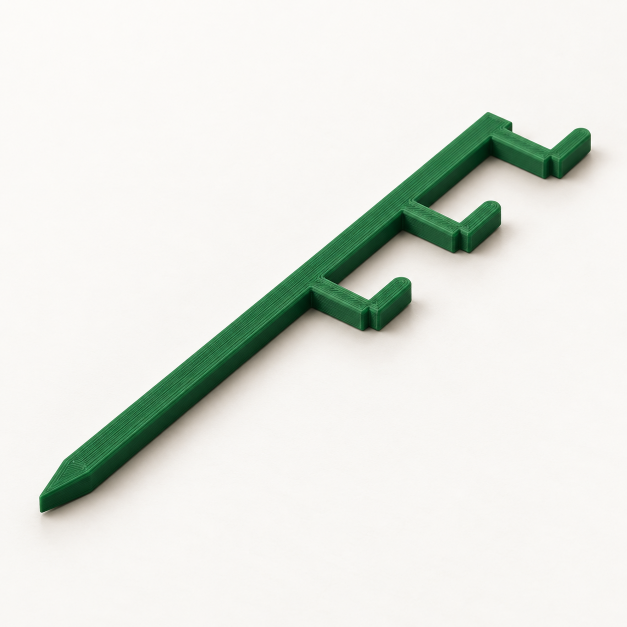 Tuteur de guidage à trois crochets latéraux ouverts – vert. Visualisation IA des dimensions par défaut.