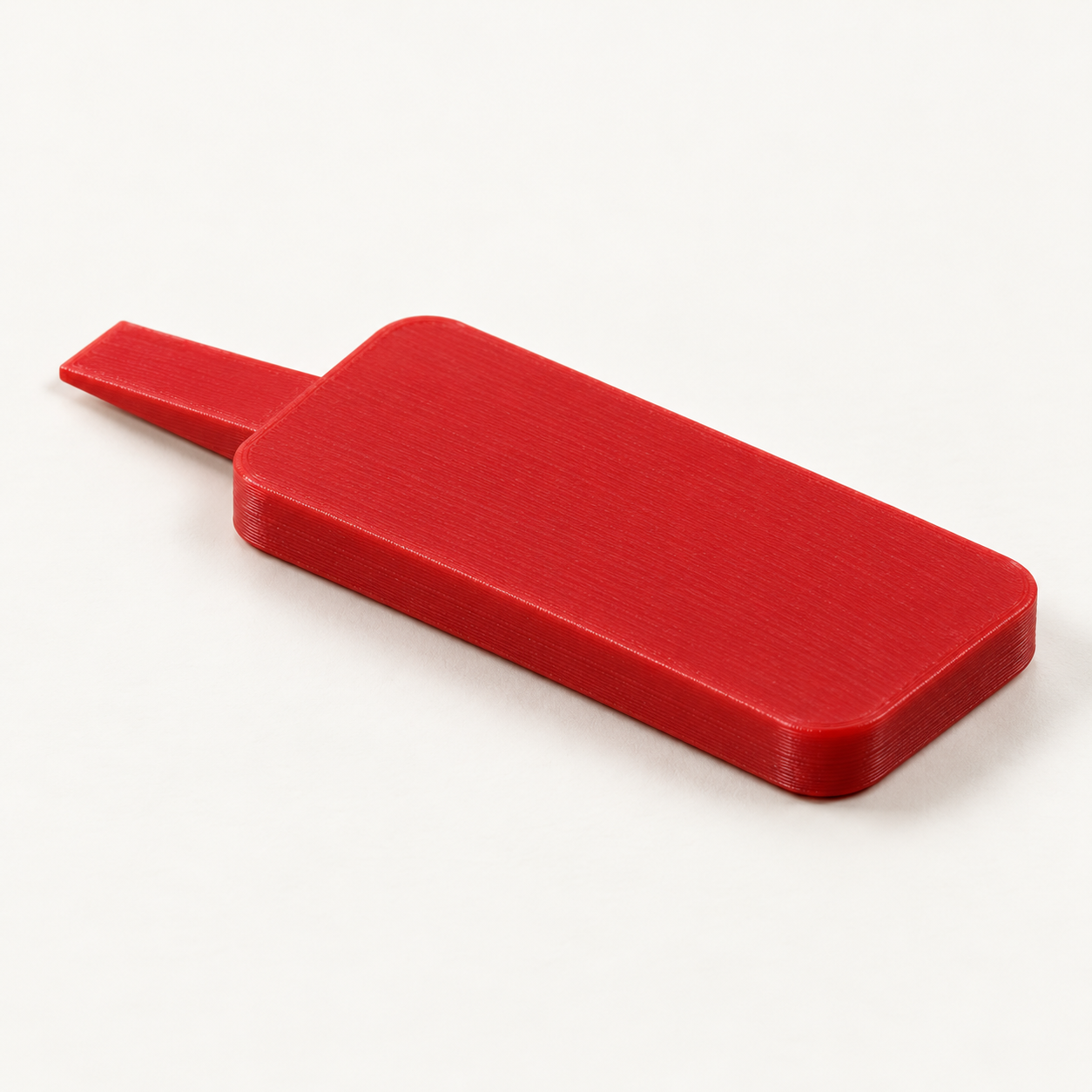 Coin d’ouverture de porte-clés à poignée plate – rouge. Visualisation IA des dimensions par défaut.