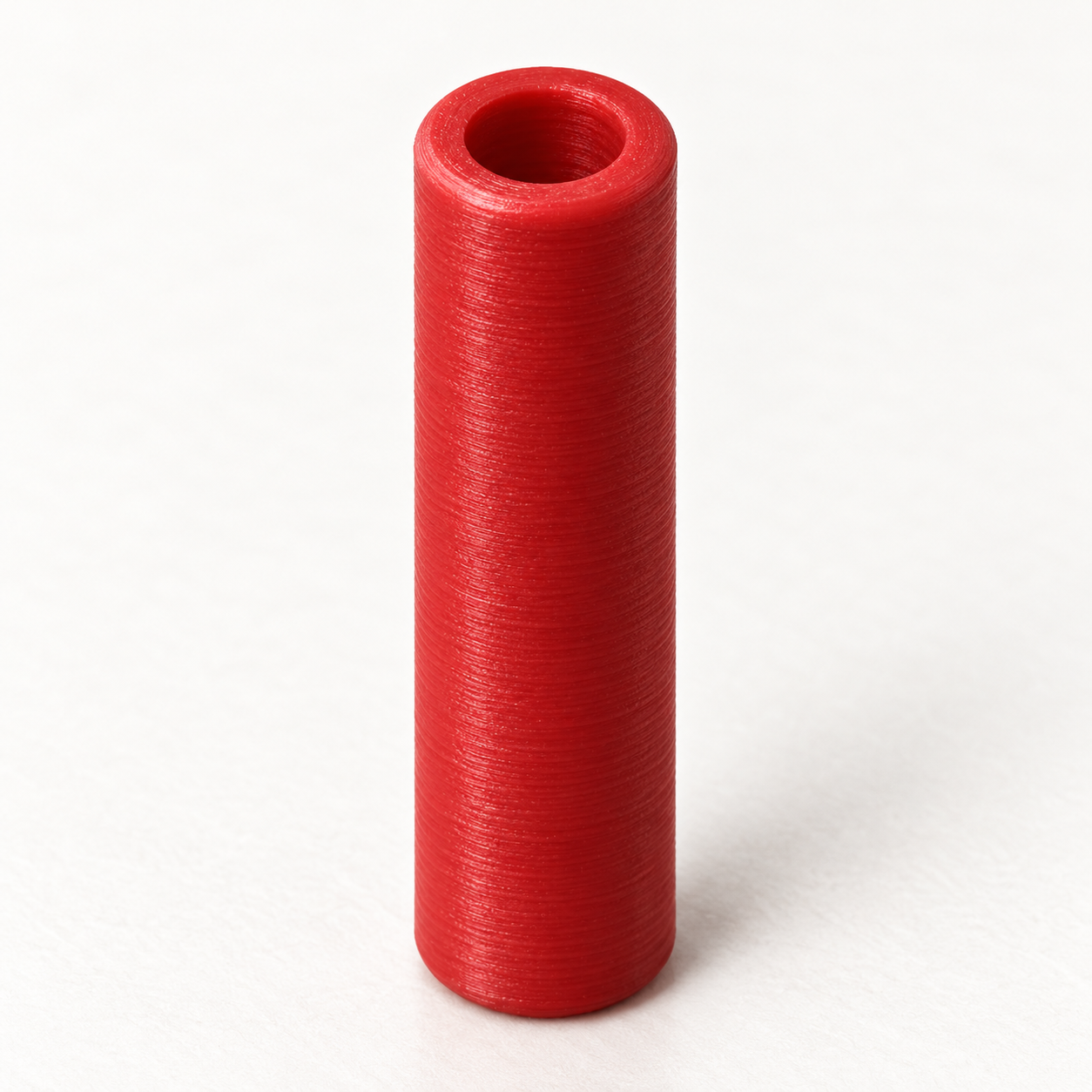 Embout de lacet à coller sur mesure – rouge. Visualisation IA des dimensions par défaut.