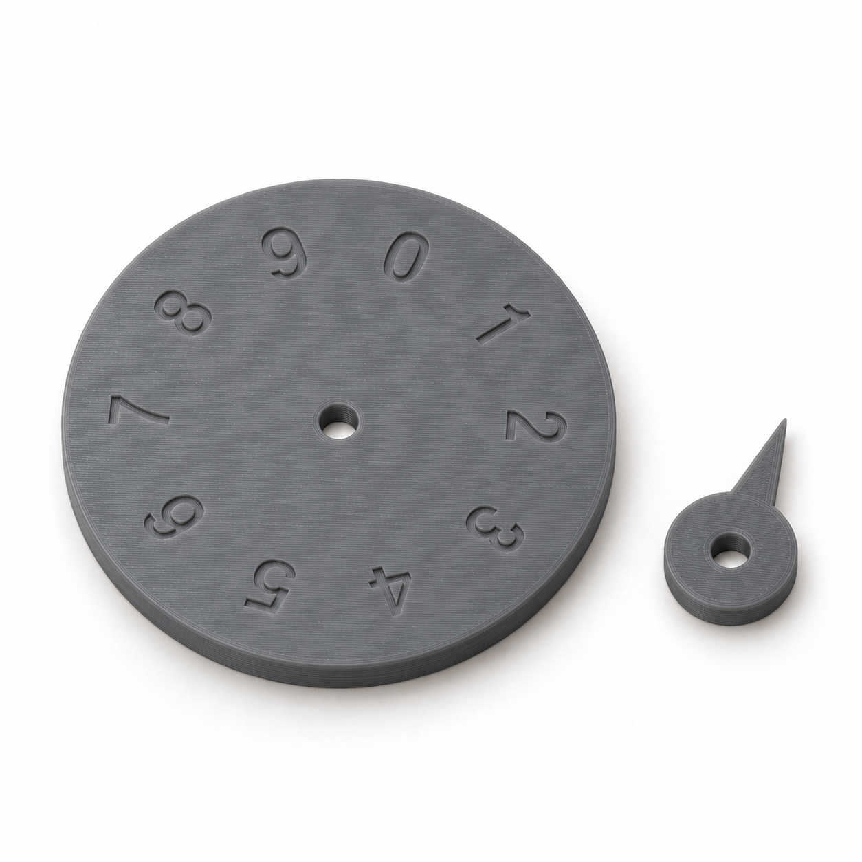 Compteur de jeu à cadran 0–9 et aiguille séparée – gris. Visualisation IA des dimensions par défaut.