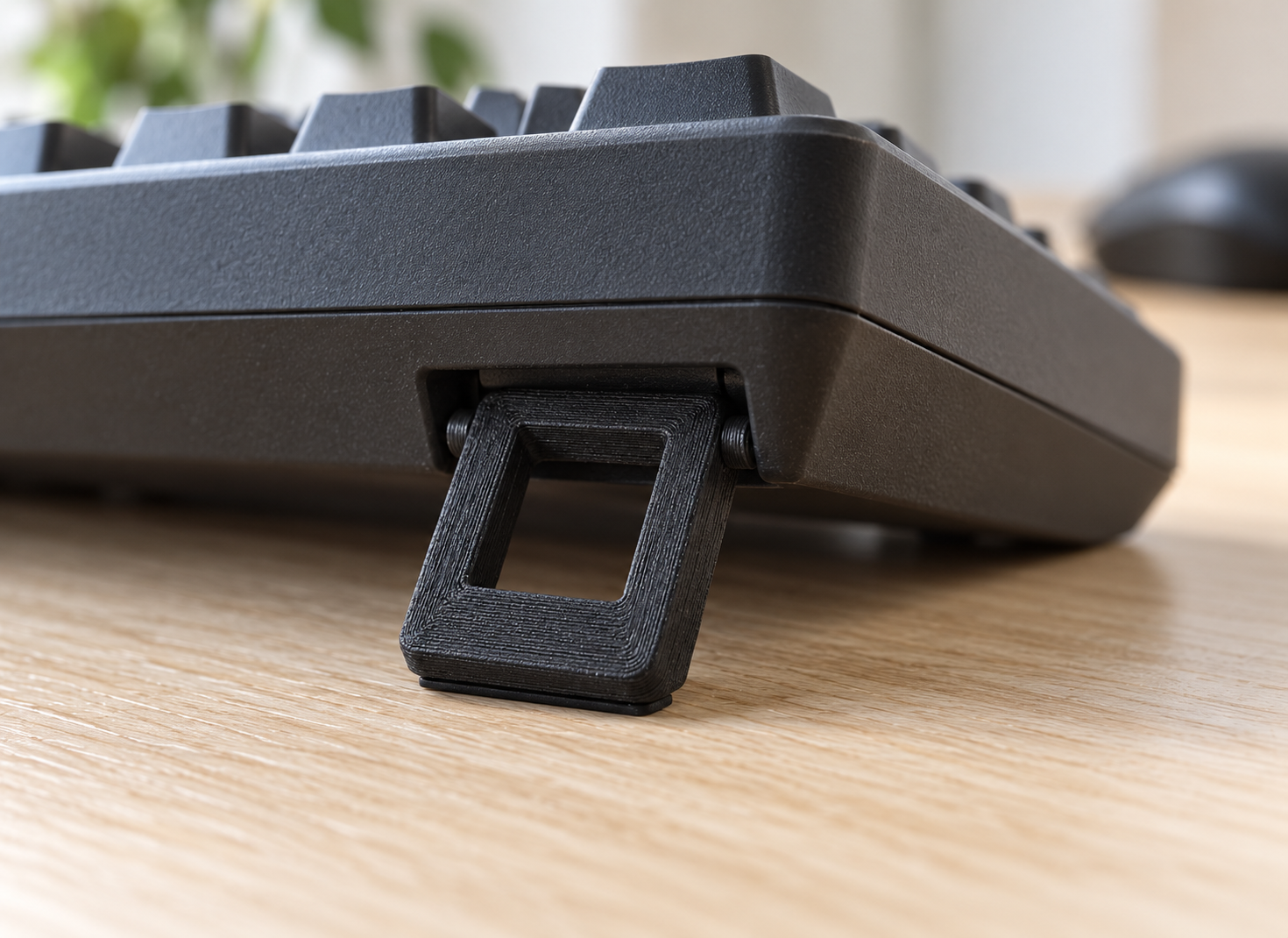 Custom keyboard tilt foot with side pivot pins