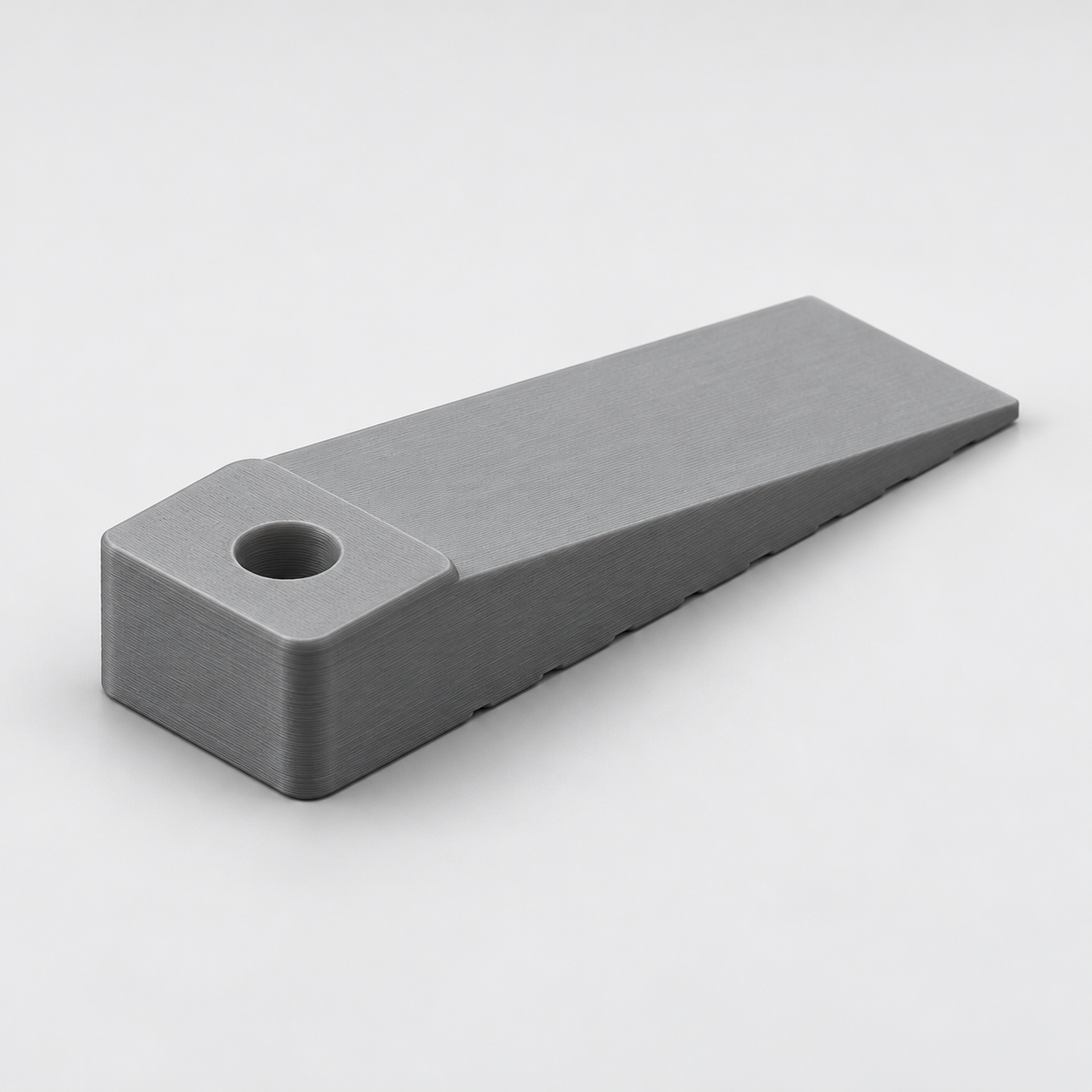 Door wedge with floor ribs and grip hole – AI product visualization
