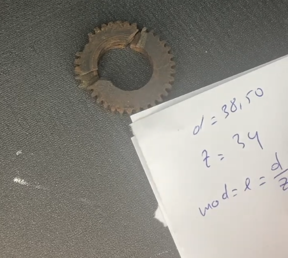 Measuring gears with calipers to determine outer diameter, number of teeth, width and module